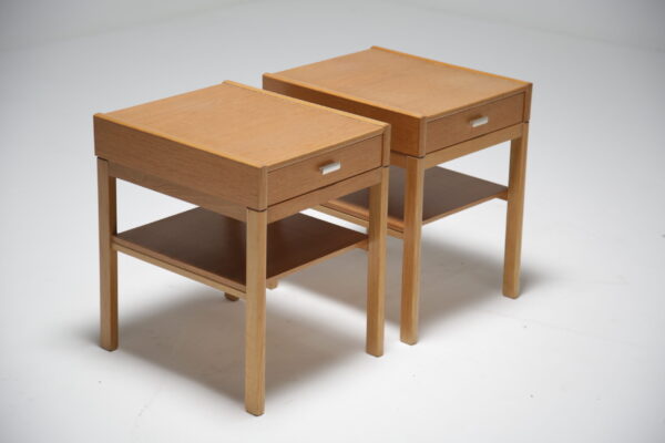 Oak bedside tables with chrome handle. 10