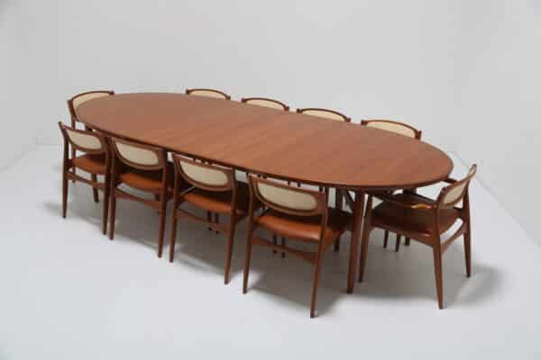 Vintage Danish Oval Teak Extending 10 Seater Dining Table Model 212 by Arne Vodder for Sibast Mobler, 1960s.